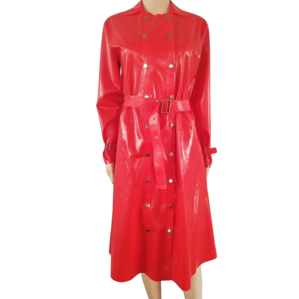 Front view of a mannequin wearing a glossy red latex trench coat with belt and snap buttons
