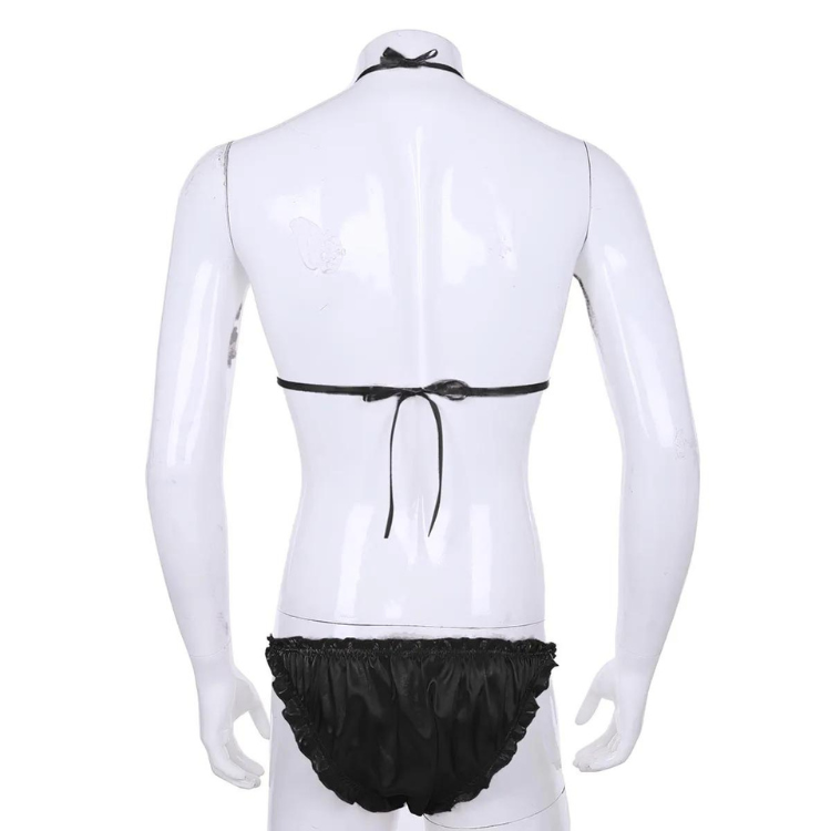 Back view of a mannequin wearing a black satin halter top and ruffled briefs