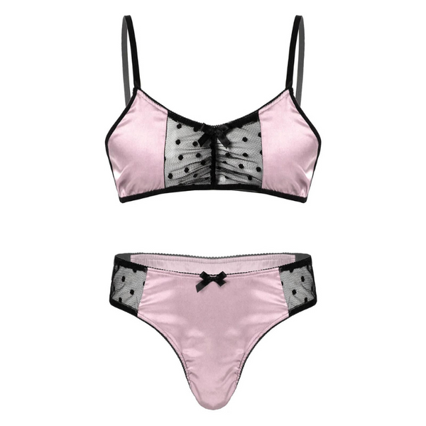 Front-facing pink satin lingerie set with black mesh polka-dot panels and bows