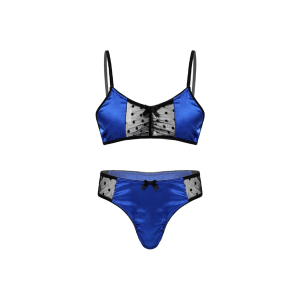 Flat lay of a blue satin lingerie set with black mesh panels and bows