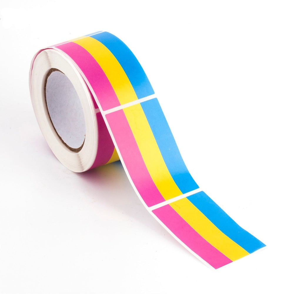 Roll of pansexual pride flag stickers with a strip extending across a white surface