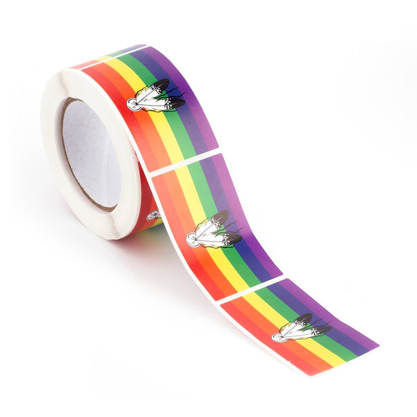 Roll of rainbow stickers featuring repeated feather-and-butterfly designs, with a strip unrolled