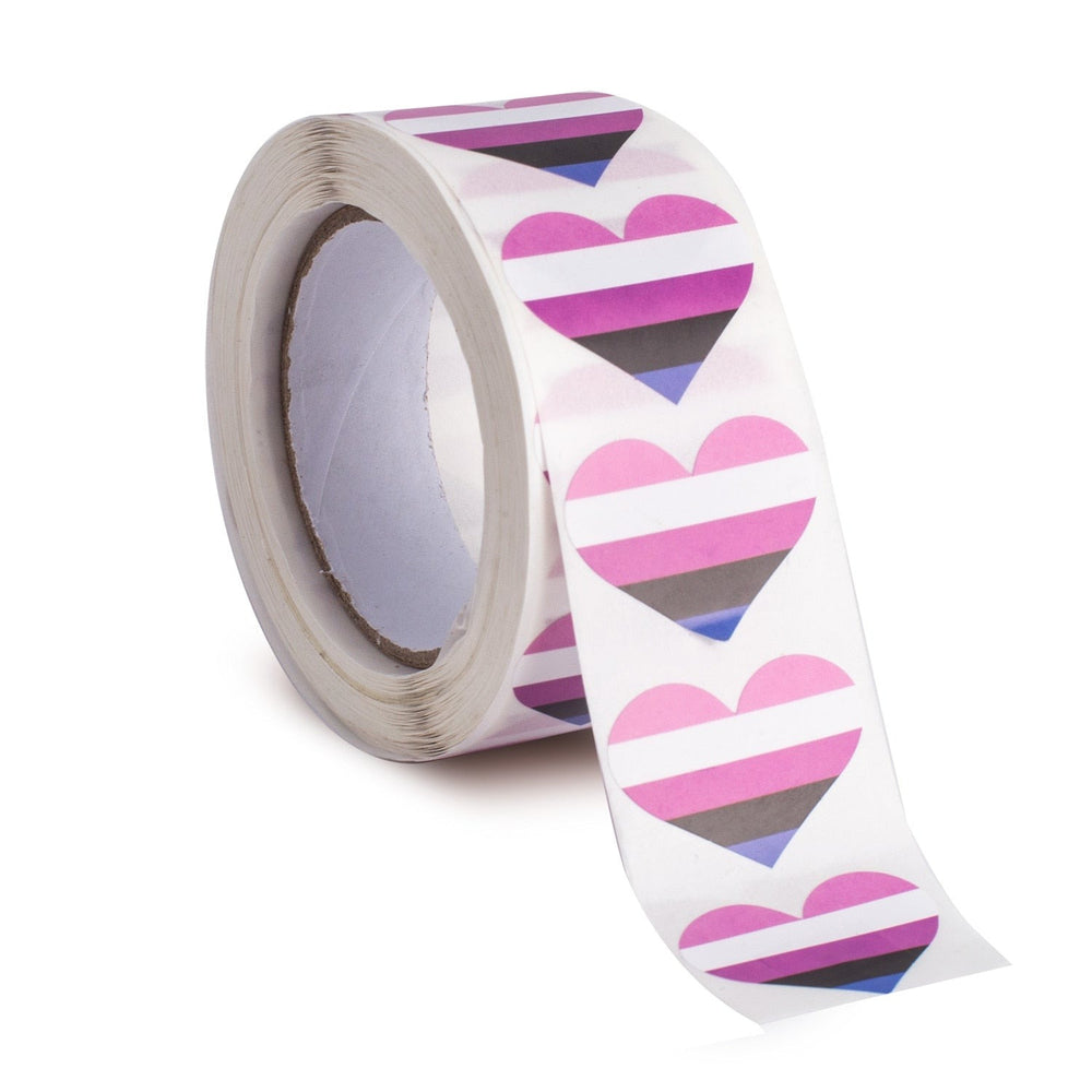 Roll of heart stickers with pink, white, black, and blue stripes, one strip unfurled