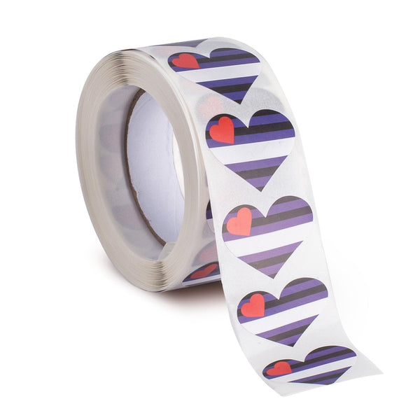 Roll of heart-shaped leather pride stickers, with one strip unrolled in front