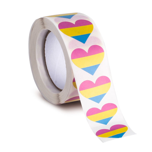 Roll of heart stickers with pink, yellow, and blue stripes, with a strip unrolled in front