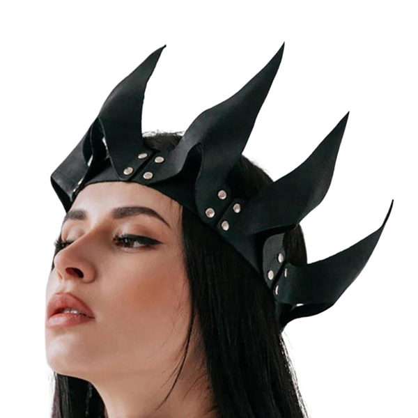 Young model wearing the Fetish Queen BDSM Crown, a bold black leather headpiece with horn-like spikes, symbolizing empowerment and sexual liberation, embodying queer pride and self-expression.