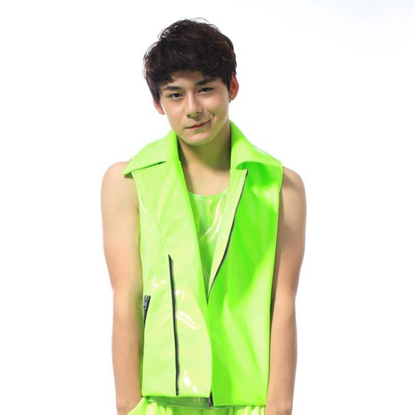 A young person models the Fluoro Green Nightclub Gogo Vest, showcasing its neon reflective spandex fabric, front zipper, and side pocket. The vest embodies bold queer pride and self-expression.