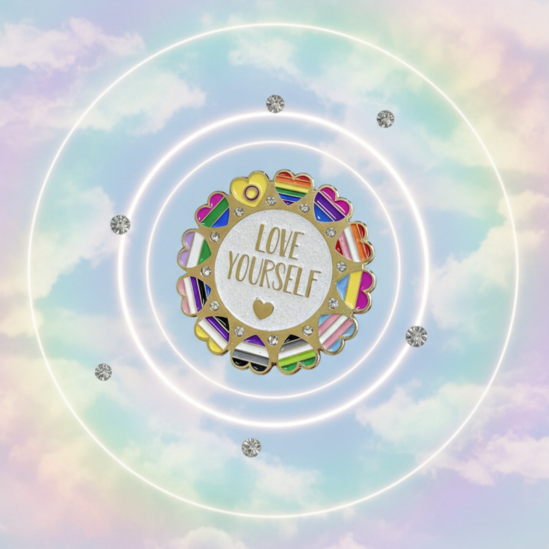 Love Yourself Rainbow Enamel Pin: A vibrant medallion with pride-flag heart details, glittery silver center reading LOVE YOURSELF, surrounded by glowing rings and sparkling gems, celebrating LGBTQIA+ pride and self-expression.