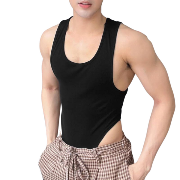 Model wearing the Modal Solid Colour Wide Shoulder Leotard, a black sleeveless bodysuit with a scoop neck, paired with brown-and-white checked drawstring pants, exuding bold queer self-expression and confidence.
