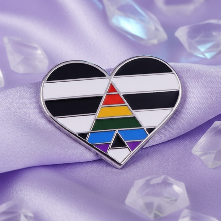 Straight Ally Pride Heart Enamel Pin on lavender satin with acrylic gems, featuring black-and-white stripes and central rainbow A motif. Celebrates LGBTQ+ pride and allyship with empowering, bold design.