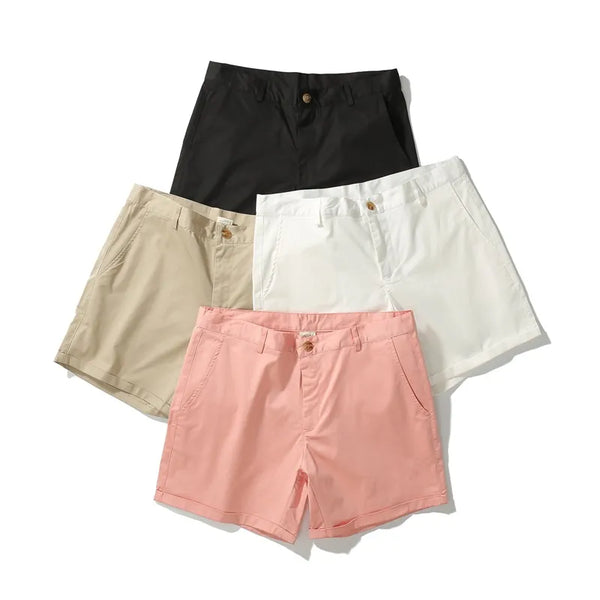 Sleek Solid Color Slim Fit Shorts in black, white, beige, and pink; tailored with belt loops and side pockets, celebrating LGBTQIA+ pride with bold style and snug fit for empowering self-expression.