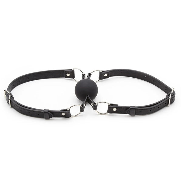 Black leather double-ball gag with adjustable straps, shown laid flat on white