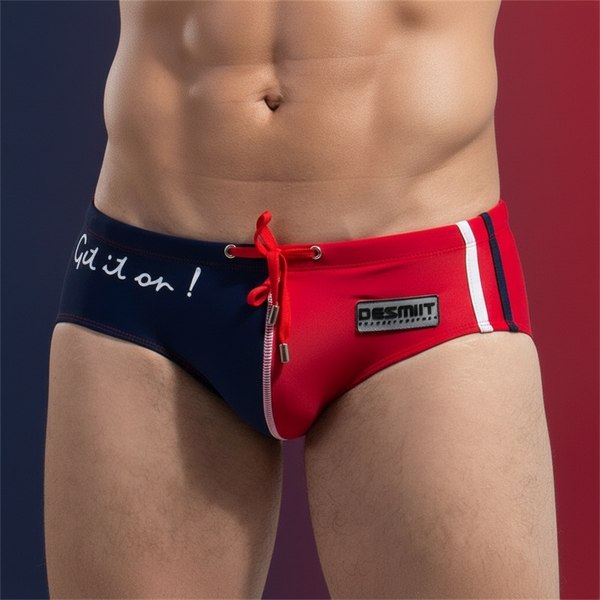 Get It On Low Rise Swim Briefs showcasing a bold navy and red color block design with empowering Get it on! script, celebrating pride and self-expression in form-fitting, quick-dry fabric.