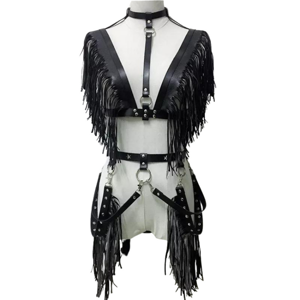 The Women's Gothic Punk Pentagram Garter Set with Tassel Bra Harness features a black faux-leather harness with fringe, O-rings, and adjustable straps for a bold, empowering statement of queer self-expression and punk edge.