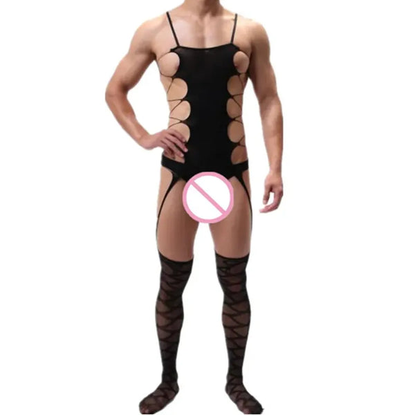 Front view of a model wearing a black strappy cutout bodysuit with thigh-high fishnet stockings