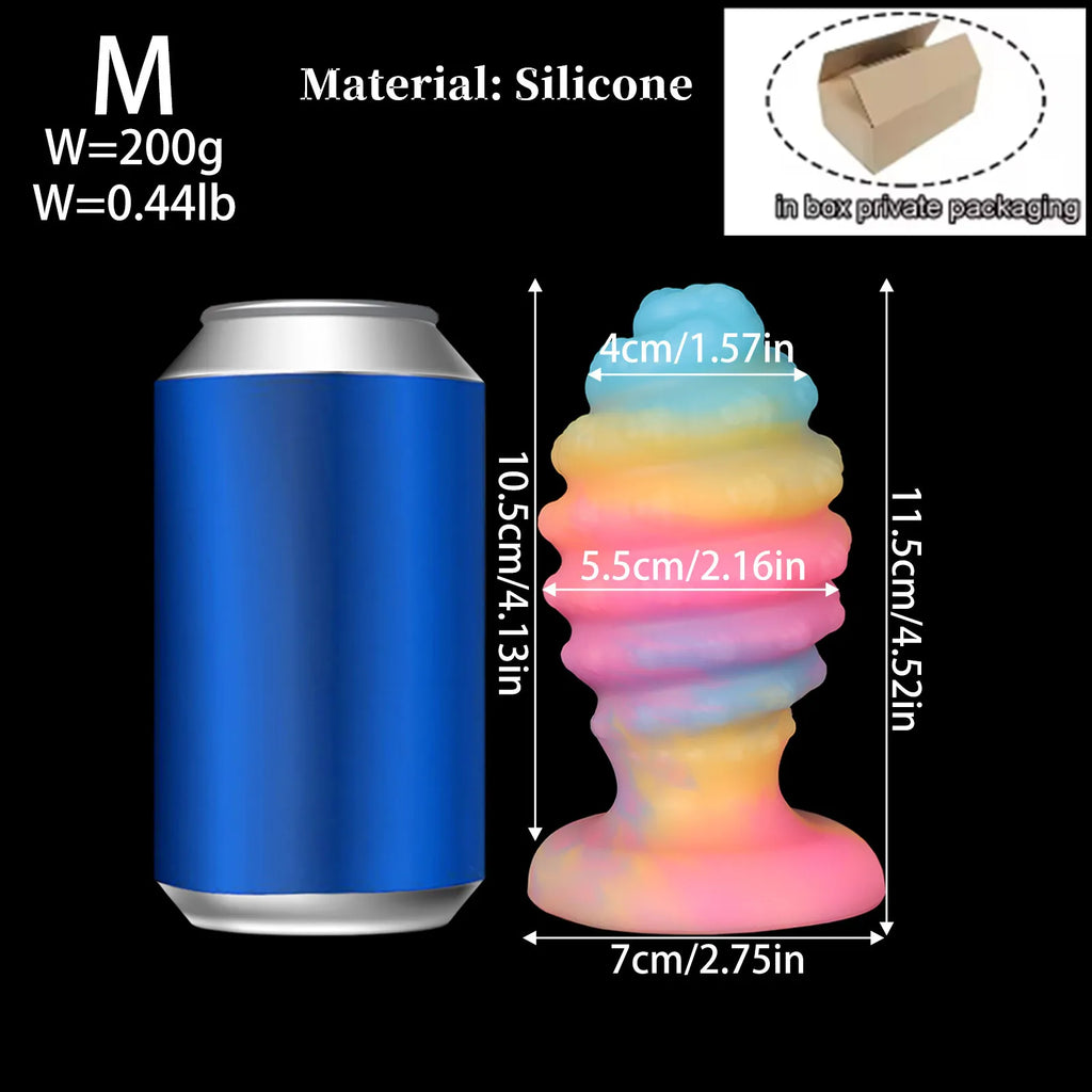 Glow-in-the-dark silicone anal plug shown beside a blue can for scale, with size measurements