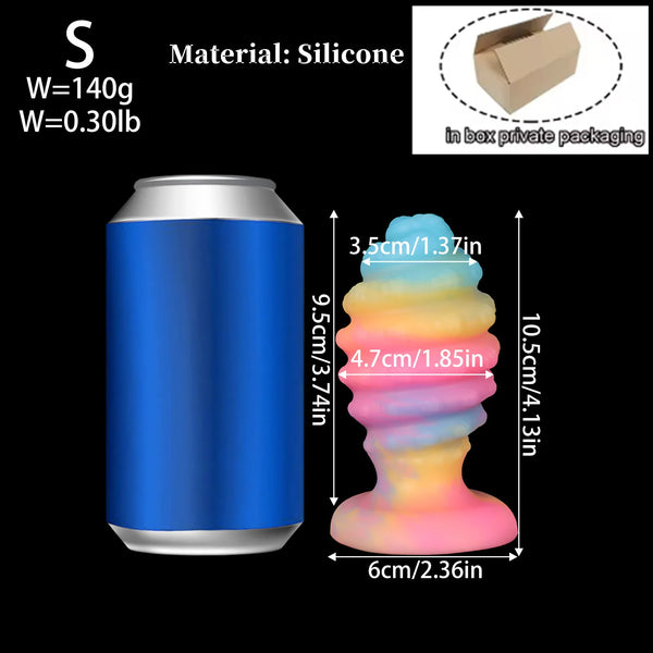 Size graphic of a pastel rainbow silicone anal plug beside a blue can-shaped remote
