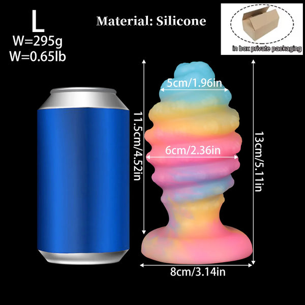 Size graphic showing a rainbow ridged silicone anal plug beside its blue canister