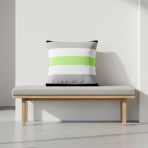The Agender Premium Pillow with gray, white, and green stripes adds subtle queer flair to a wood bench with gray cushion