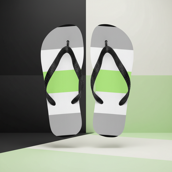 Pair of black-strap flip-flops floating upright, with gray, white, and bright green striped footbeds