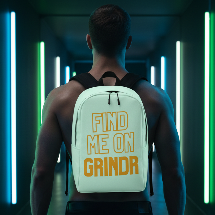 Find Me On Grindr Minimalist Backpack with bold yellow text, rocked by a shirtless muscular person in a neon-lit hallway, queer vibes.