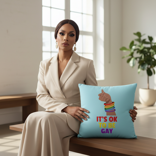 A woman in a beige suit sits on a wooden bench, holding the 