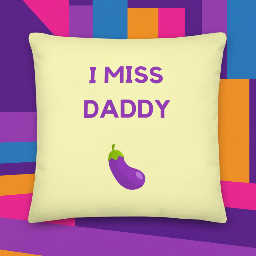 Cream-colored "I Miss Daddy" pillow with purple text, cartoon eggplant, and a bright geometric LGBT-inspired background.