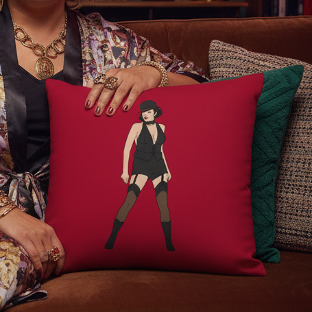 Red throw pillow featuring an illustrated person in a black hat, suit, and thigh-high stockings