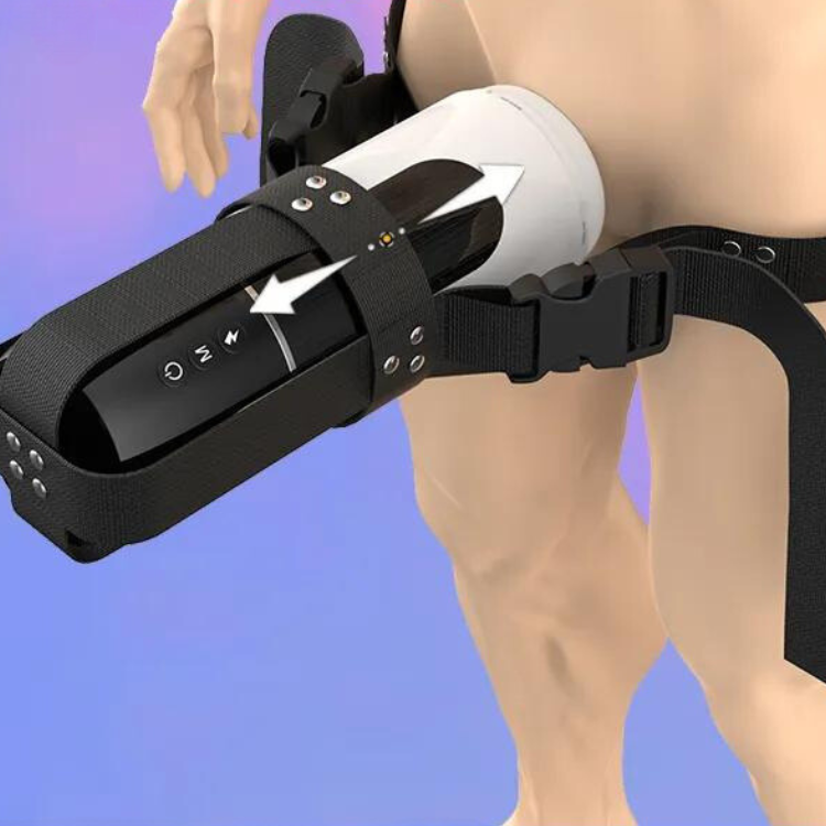 Close-up of a black wearable masturbator strapped around a model’s hips and thigh
