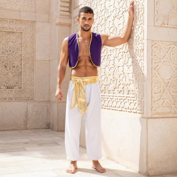 Front-view model wearing a purple vest, gold sash, and white harem pants