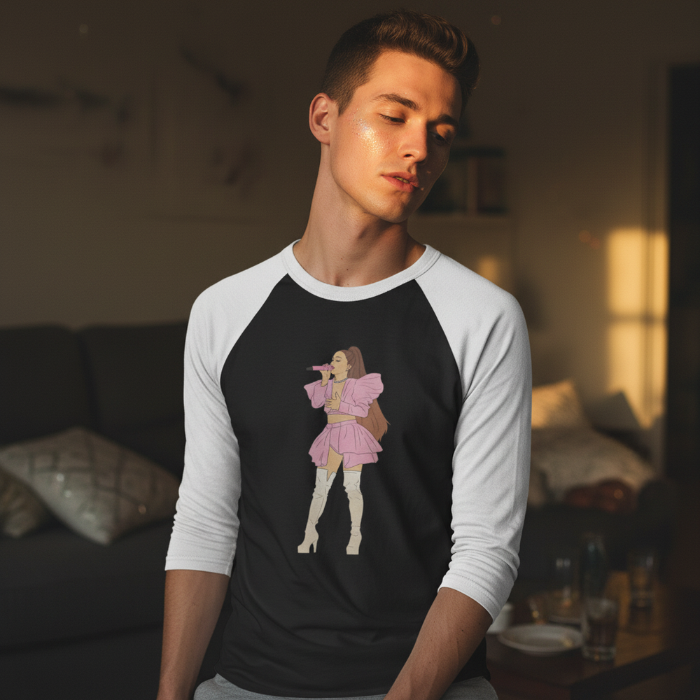 A person in soft sunlight rocks an Ariana Grande 3/4 sleeve raglan tee with their singing graphic, chilling
