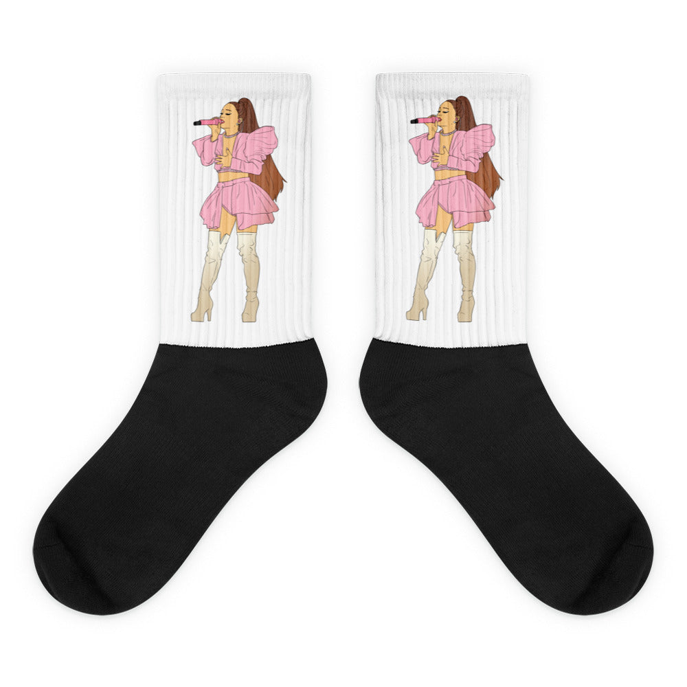 Pair of white ribbed crew socks with black feet and pink singer illustrations