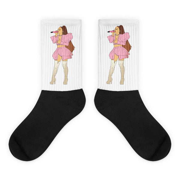 Pair of white ribbed crew socks with black feet and pink singer illustrations
