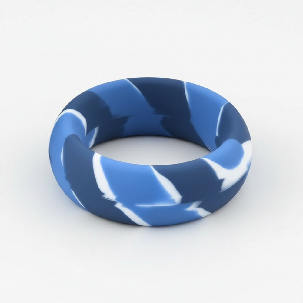 Glossy blue-and-white camouflage cock ring shown upright on a white background