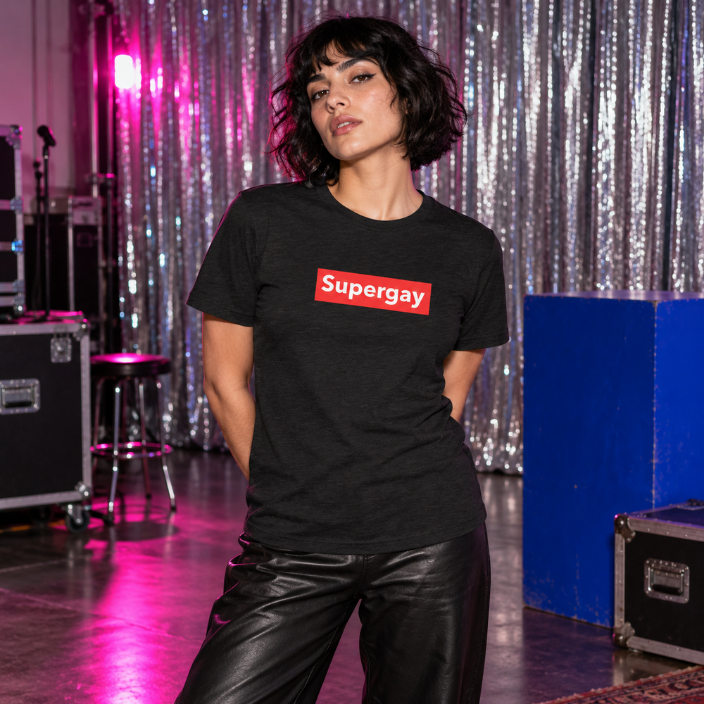 Supergay T-Shirt in Black Heather, photographed in a sculptural ARTPOP CHAOS backstage setting.