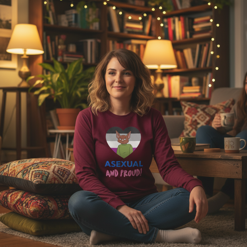 Asexual And Proud unisex long sleeve tee with a cartoon fox, worn by a person in a cozy, book-filled, softly-lit living room