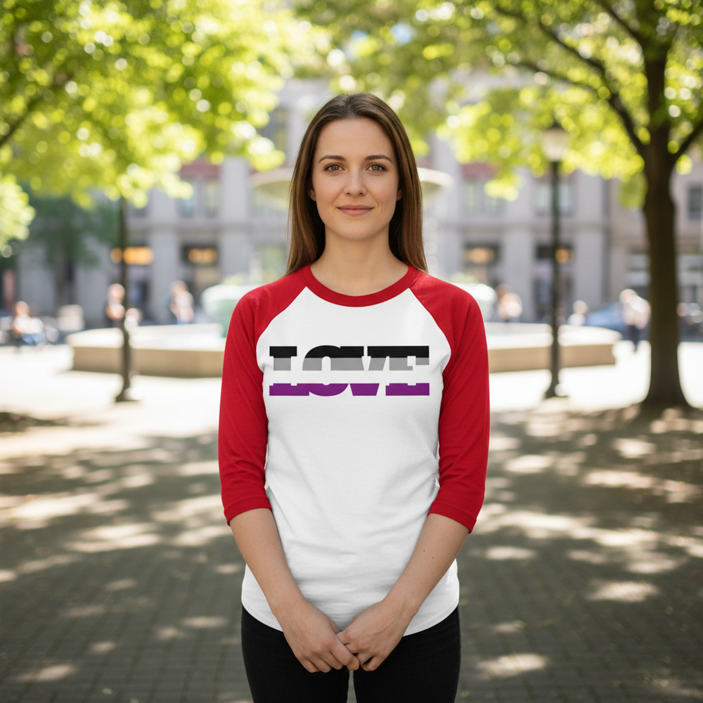 Person outdoors wearing a white-and-red raglan shirt with bold LOVE lettering in black, gray, white and purple.