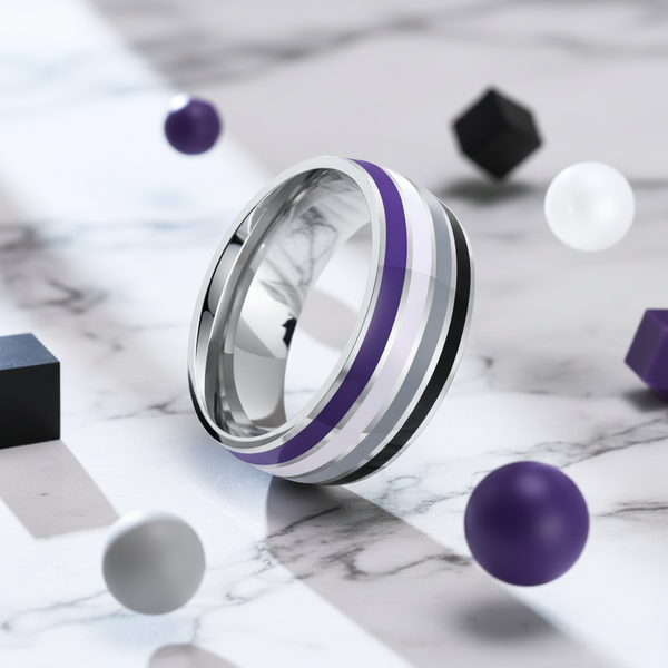 A silver ring with purple, white, gray, and black stripes, standing on marble