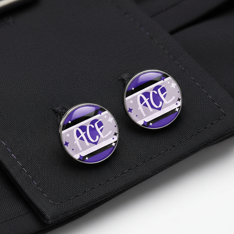 Two round ACE cufflinks with purple, white, and black starry designs on black fabric