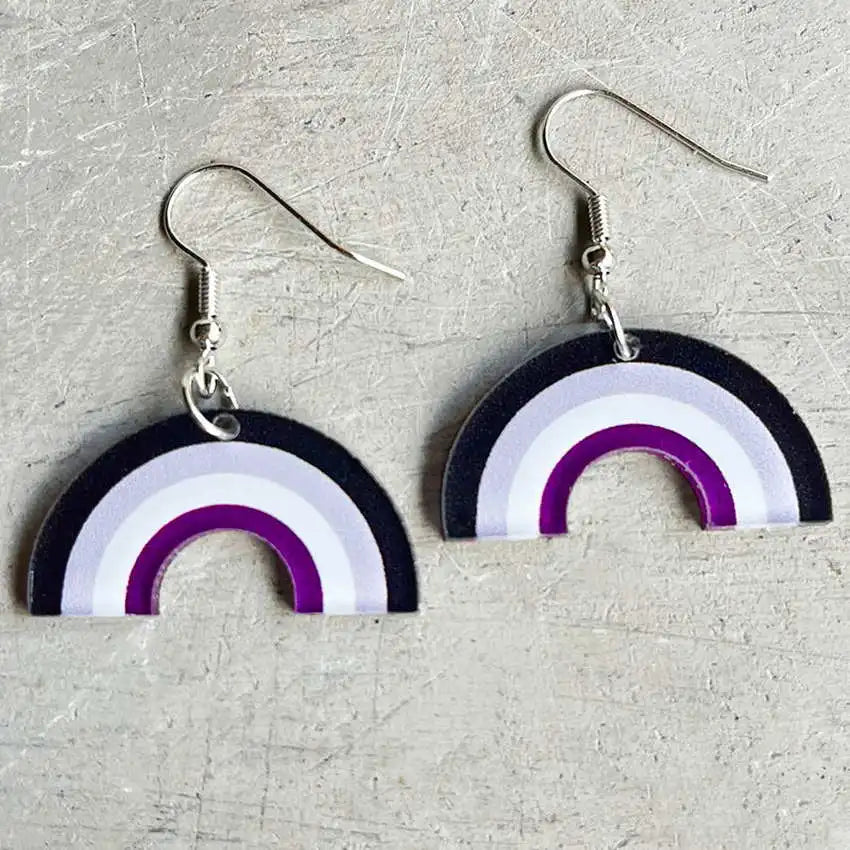 Pair of acrylic dangle earrings with black, white, and purple rainbow arches