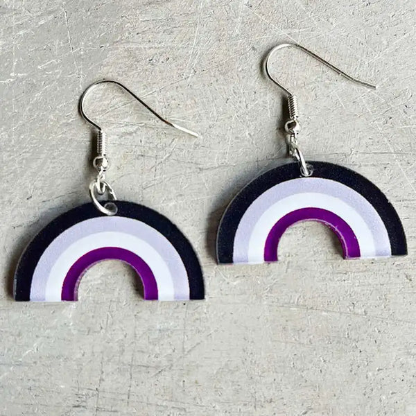 Pair of acrylic dangle earrings with black, white, and purple rainbow arches