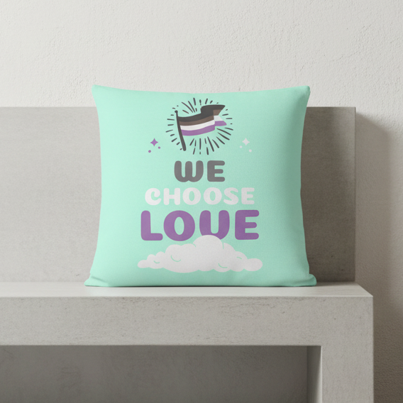 Asexual “We Choose Love” pillow with bold white and purple text, cloud, sparkling ace pride flag on mint green