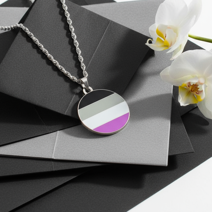 Close-up of an asexual pride pendant necklace with black, gray, white, and purple stripes