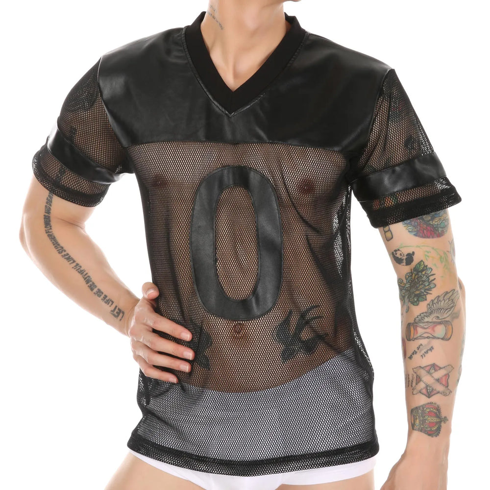 Front view of a tattooed model wearing a black sheer fishnet top with faux-leather panels