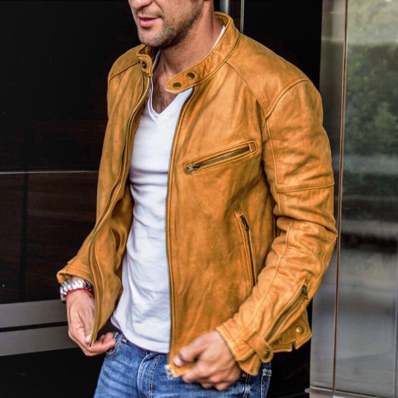 Cropped person modeling a tan leather-look jacket over a white T-shirt