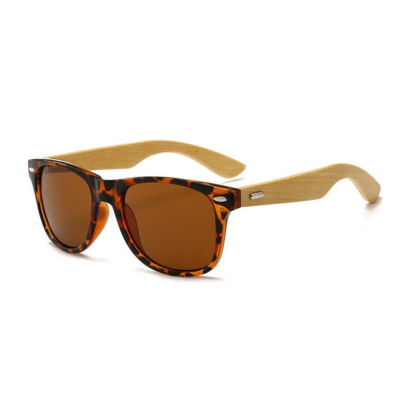 Tortoiseshell sunglasses with brown lenses and light bamboo-colored arms, shown at an angle