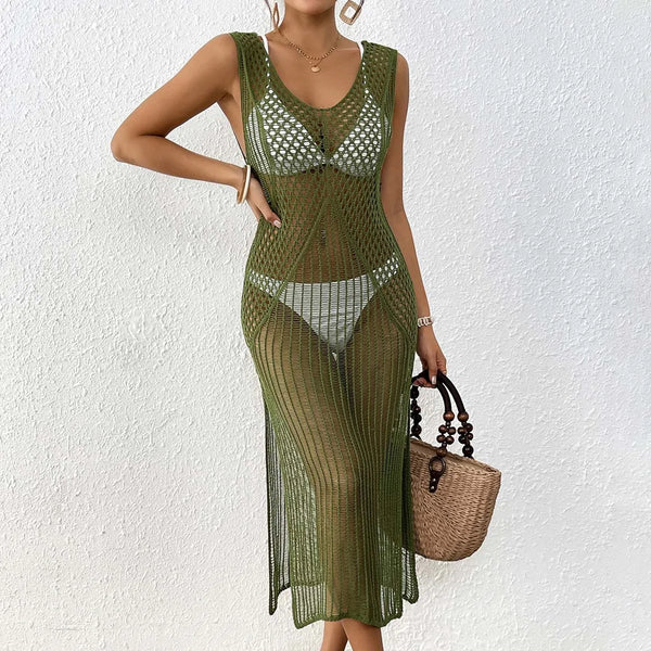 Front view of a model wearing a sheer olive-green crocheted beach cover-up over a white bikini