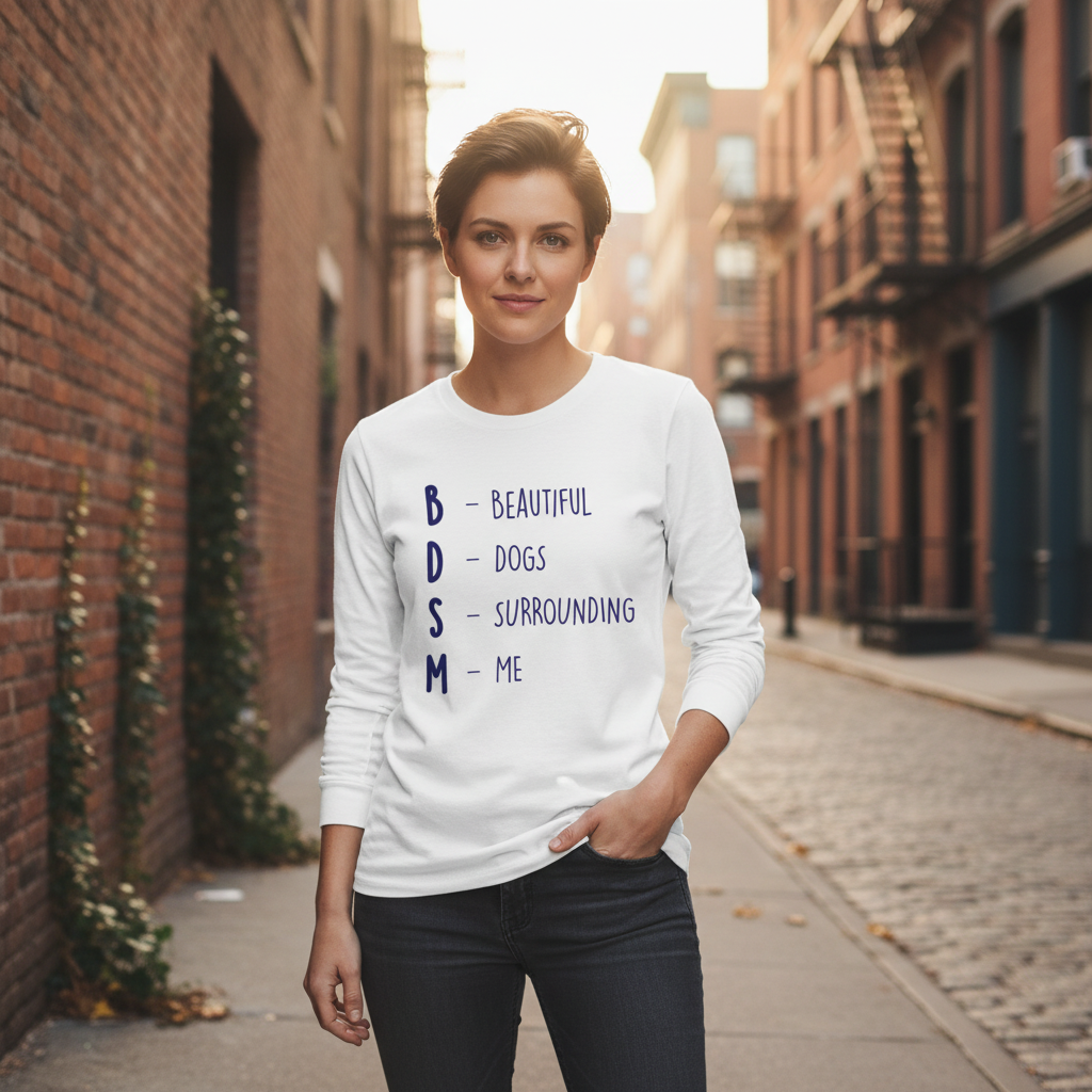Unisex long sleeve T-shirt with "BDSM (Beautiful Dogs Surrounding Me)" slogan, worn by a smiling person on a city street