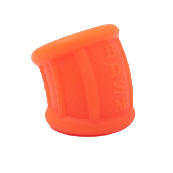 Orange silicone scrotum bondage thimble shown upright at a slight angle on white