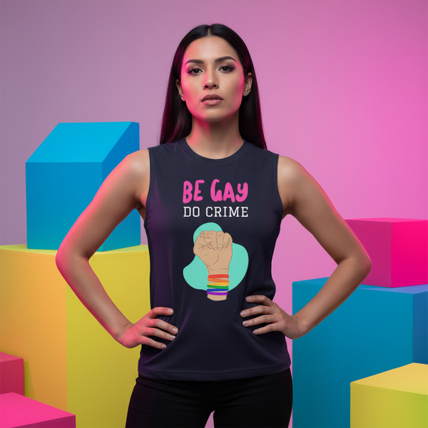 Be Gay Do Crime muscle top with slogan and raised fist graphic in rainbow bracelets, model, pink-purple on blue backdrop